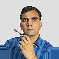 Deepak Vishwakarma holding a pencil